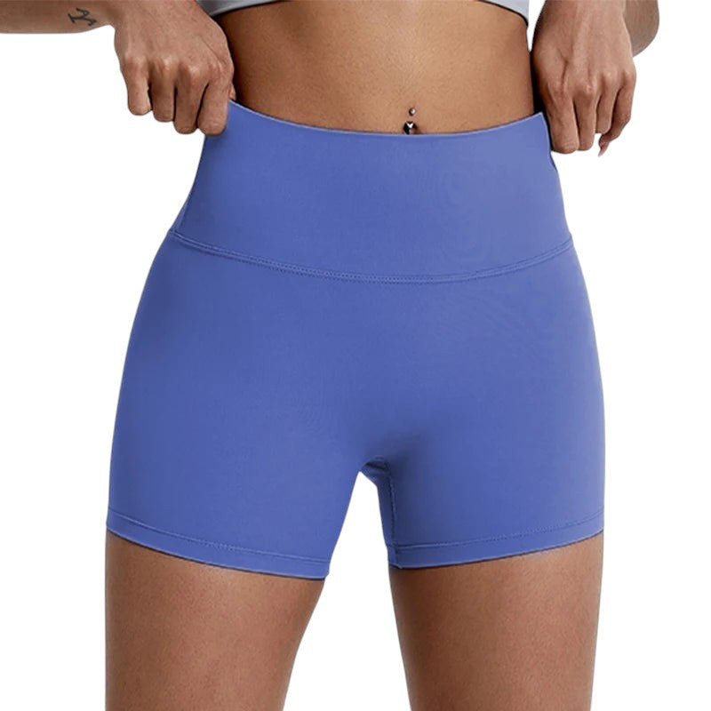 COMFORTHigh-waisted periwinkle athletic shorts with seamless construction and four-way stretch fabric.