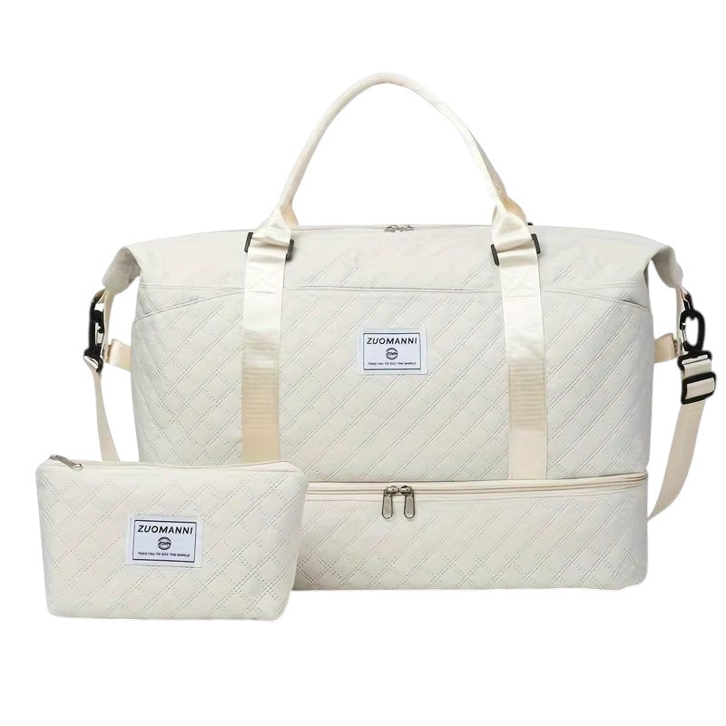 COMFORTH Quilted Duffel Bag with matching pouch in cream, featuring diamond quilting and a separate bottom compartment.