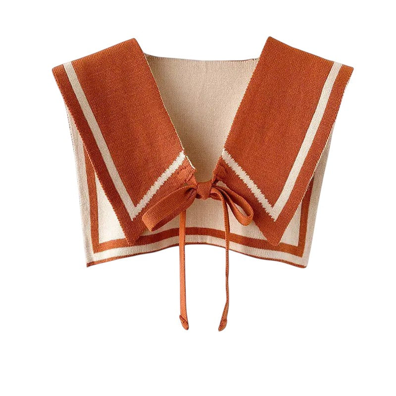 COMFORTH Knit sailor collar in burnt orange and cream with white trim and tie closure. Detachable accessory.
