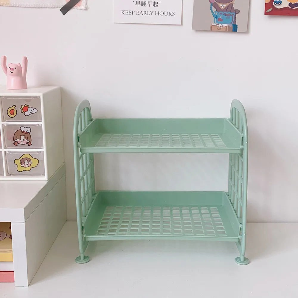 COMFORTH Two Tier Desk Organizer Shelf in mint green plastic with a bed frame design. Perfect for stationery or cosmetics.