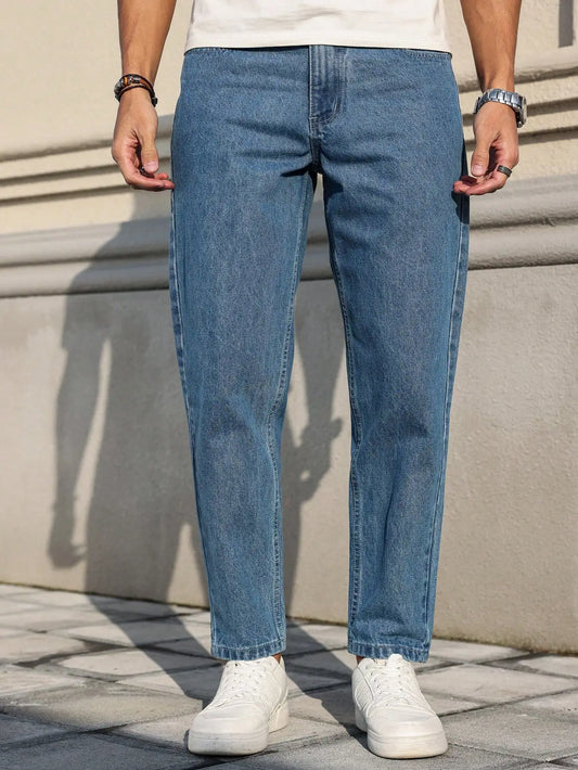 Men's jeans are made of classic blue denim fabric with a loose fit, making them an indispensable versatile item in the wardrobe. Blue