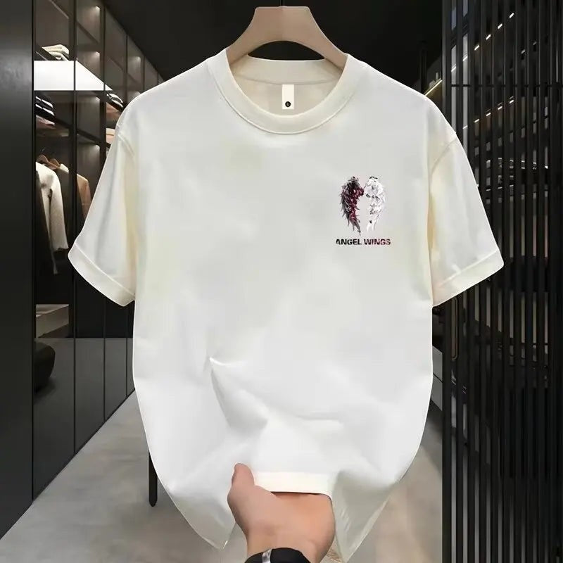 COMFORTH Angel Wings graphic t-shirt in cream cotton with split dark and white wing design.