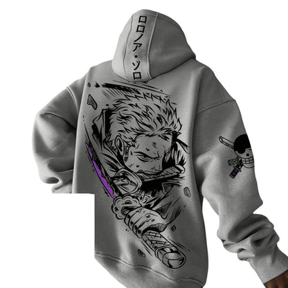 COMFORTH grey anime graphic hoodie with Roronoa Zoro illustration and Japanese lettering on hood. Features a front pocket and One Piece Jolly Roger on sleeve.