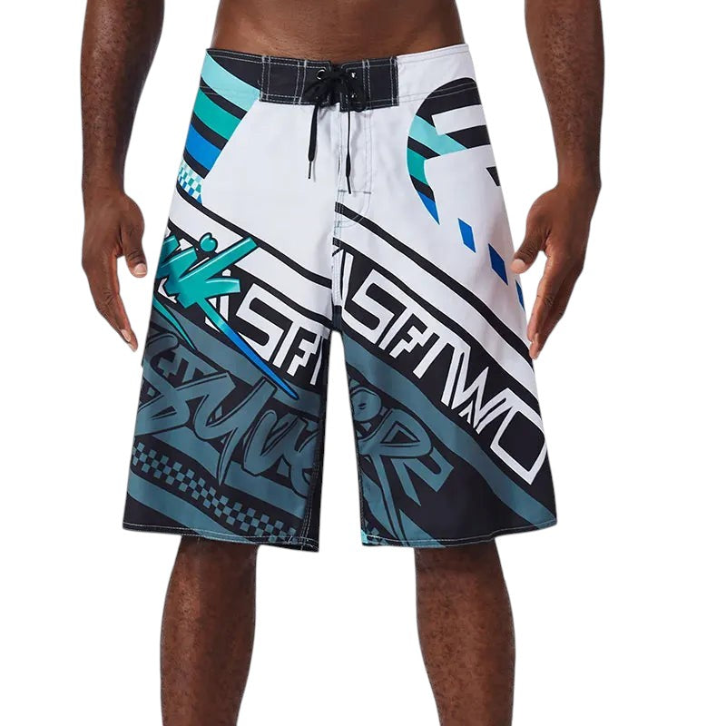 COMFORTH Men's athletic board shorts with white, black, teal, and blue graphic print and drawstring closure.