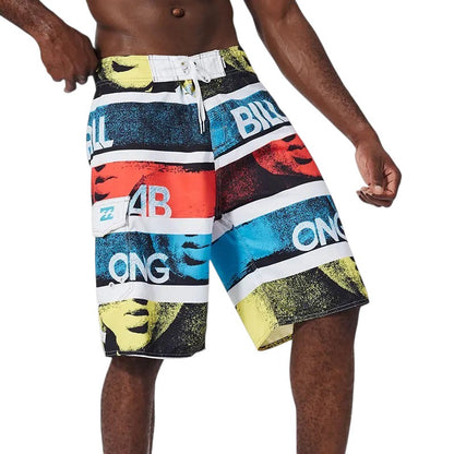 COMFORTH Men's athletic board shorts with bold black, white, red, blue, and yellow graphic print and drawstring waist.