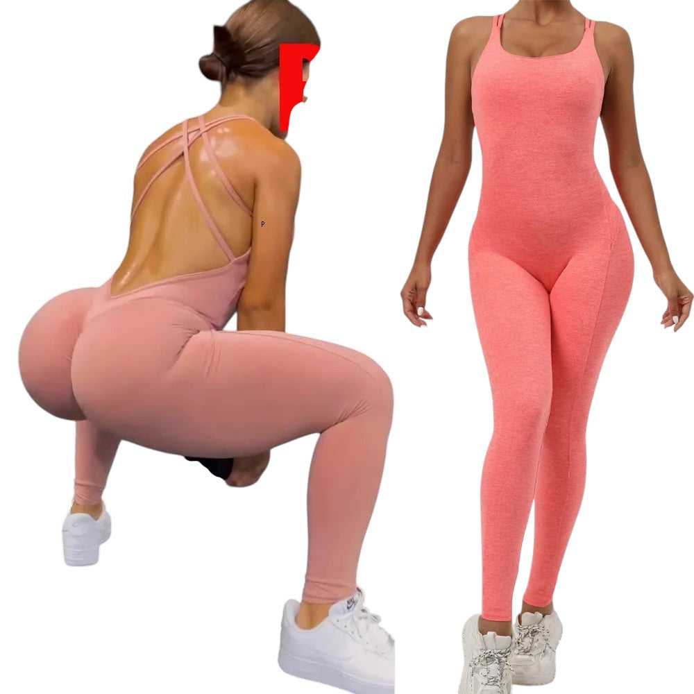COMFORTH women's coral athletic bodysuit with open back crisscross straps and full-length legs. Model is squatting.