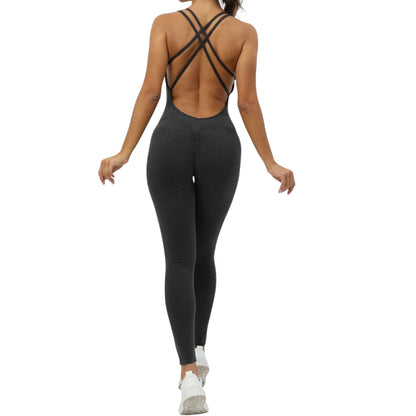 COMFORTH Women's athletic bodysuit in dark grey with open back and crisscross straps, ruched detail on back.