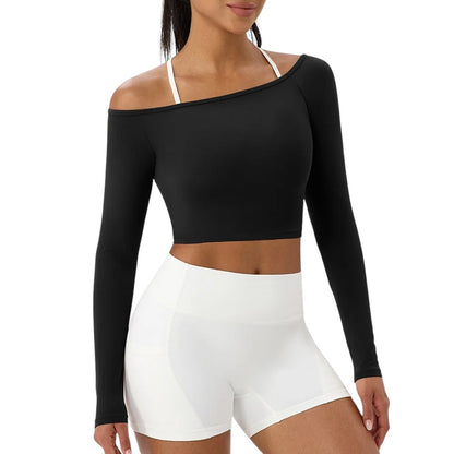 COMFORT black long sleeve athletic crop top with asymmetrical neckline, made of nylon and spandex blend.