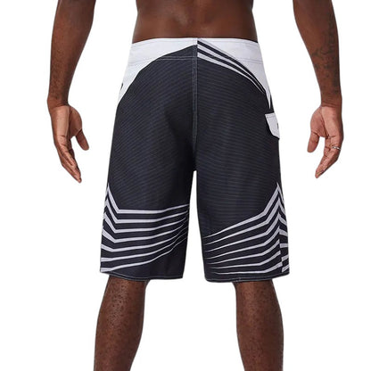COMFORTH Men's black and white athletic striped board shorts with drawstring closure and quick-drying fabric.