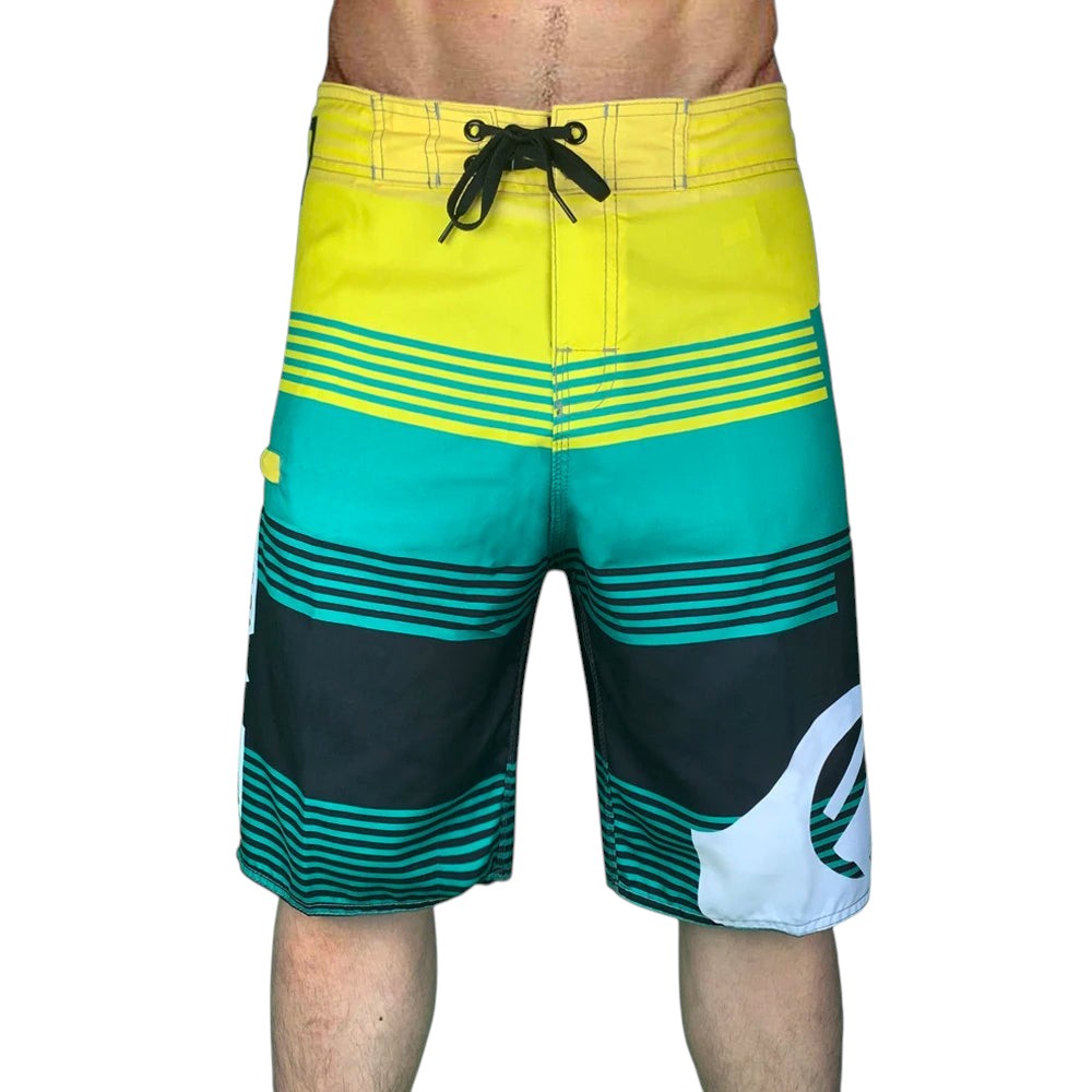 COMFORTH Men's athletic board shorts with yellow, teal, and black horizontal stripes and a white logo.