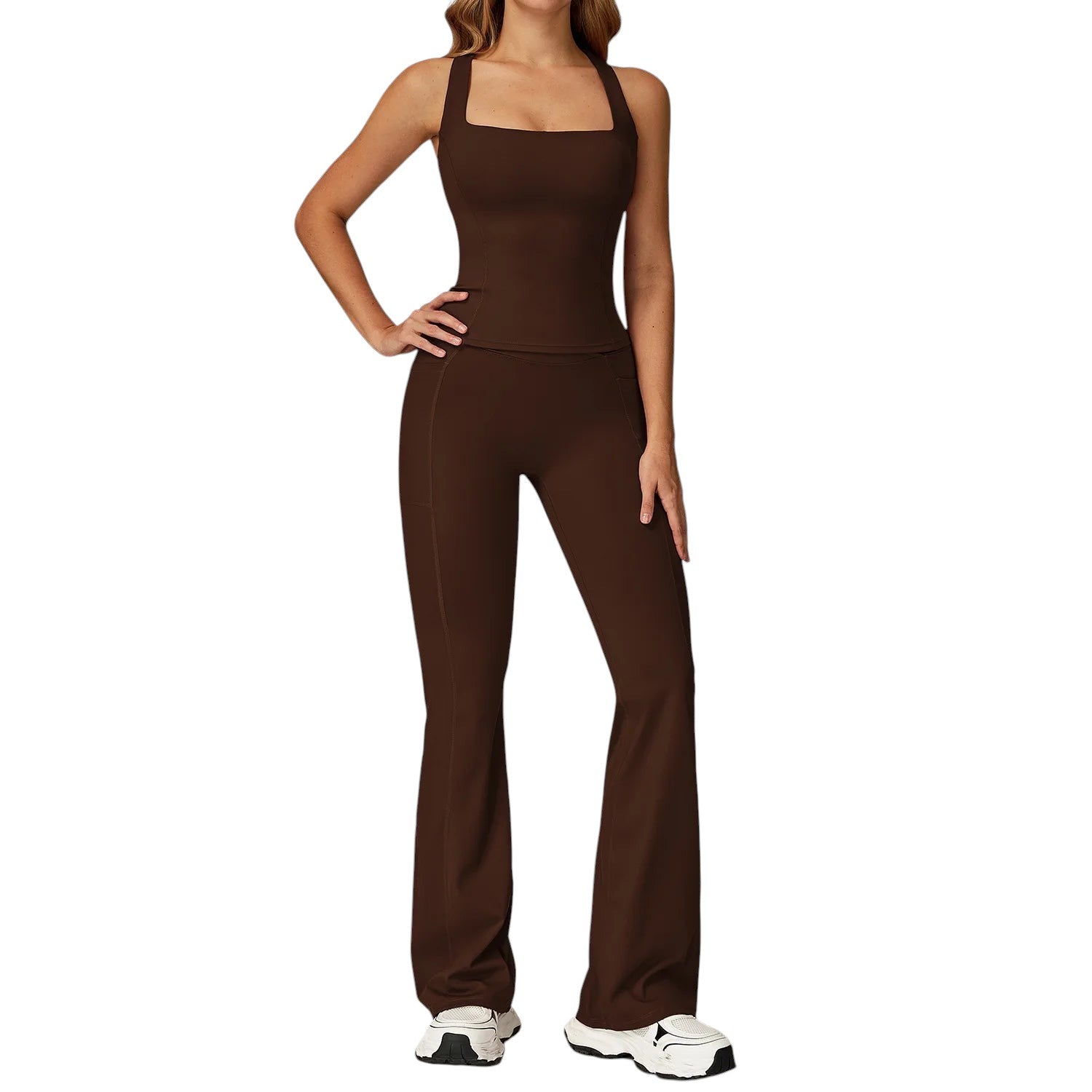COMFORTH women's brown athletic two-piece set with halter neck sports bra and V-waist flare leggings.