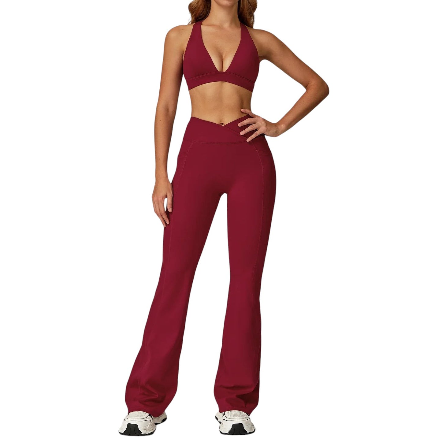COMFORTH women's athletic two-piece set with V-neck halter bra and high-waisted flare leggings in deep red.