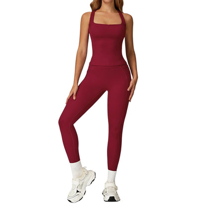 COMFORTH women's athletic two-piece set in deep red, featuring a halter neck sports bra and high-waisted flare leggings with V-waistband.