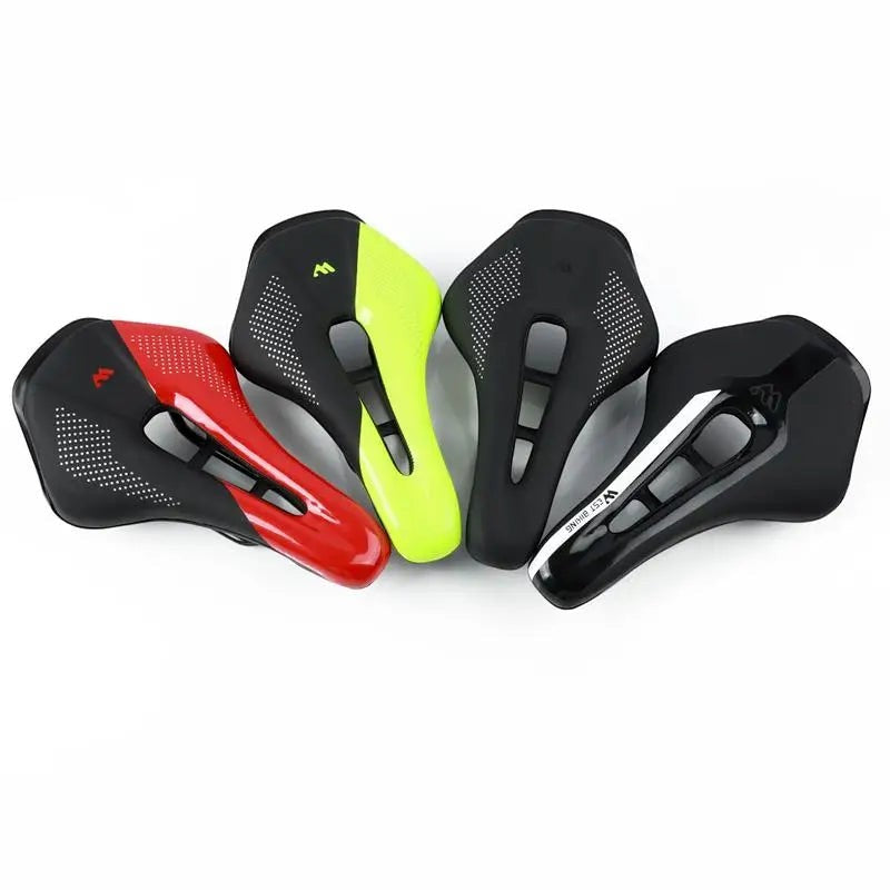 COMFORT bicycle saddle with red and black dual-tone design, central channel, and textured grip. Lightweight and durable.