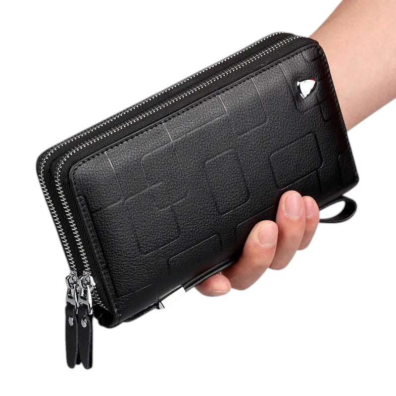 COMFORT black faux leather double zipper wristlet wallet organizer with embossed geometric pattern and detachable strap.