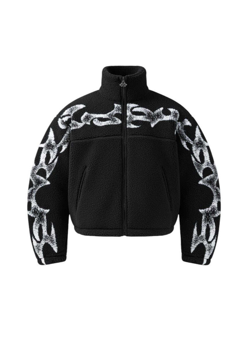 COMFORT black fleece jacket with white abstract flame graphic print, high collar, and full zip.