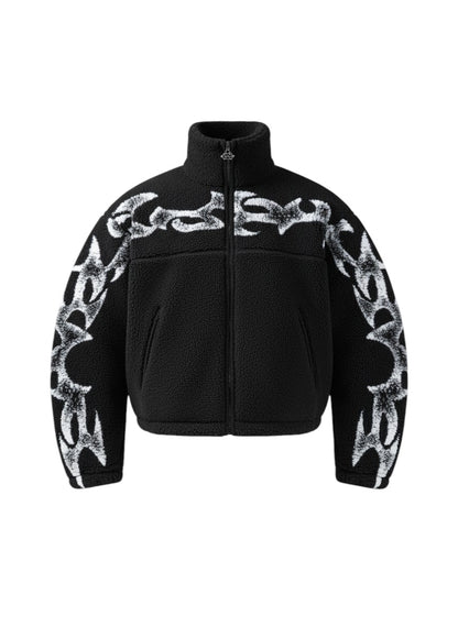 COMFORT black fleece jacket with white abstract flame graphic print, high collar, and full zip.