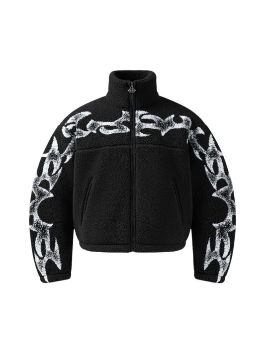 COMFORT black fleece jacket with white abstract flame graphic print, high collar, and full zip.