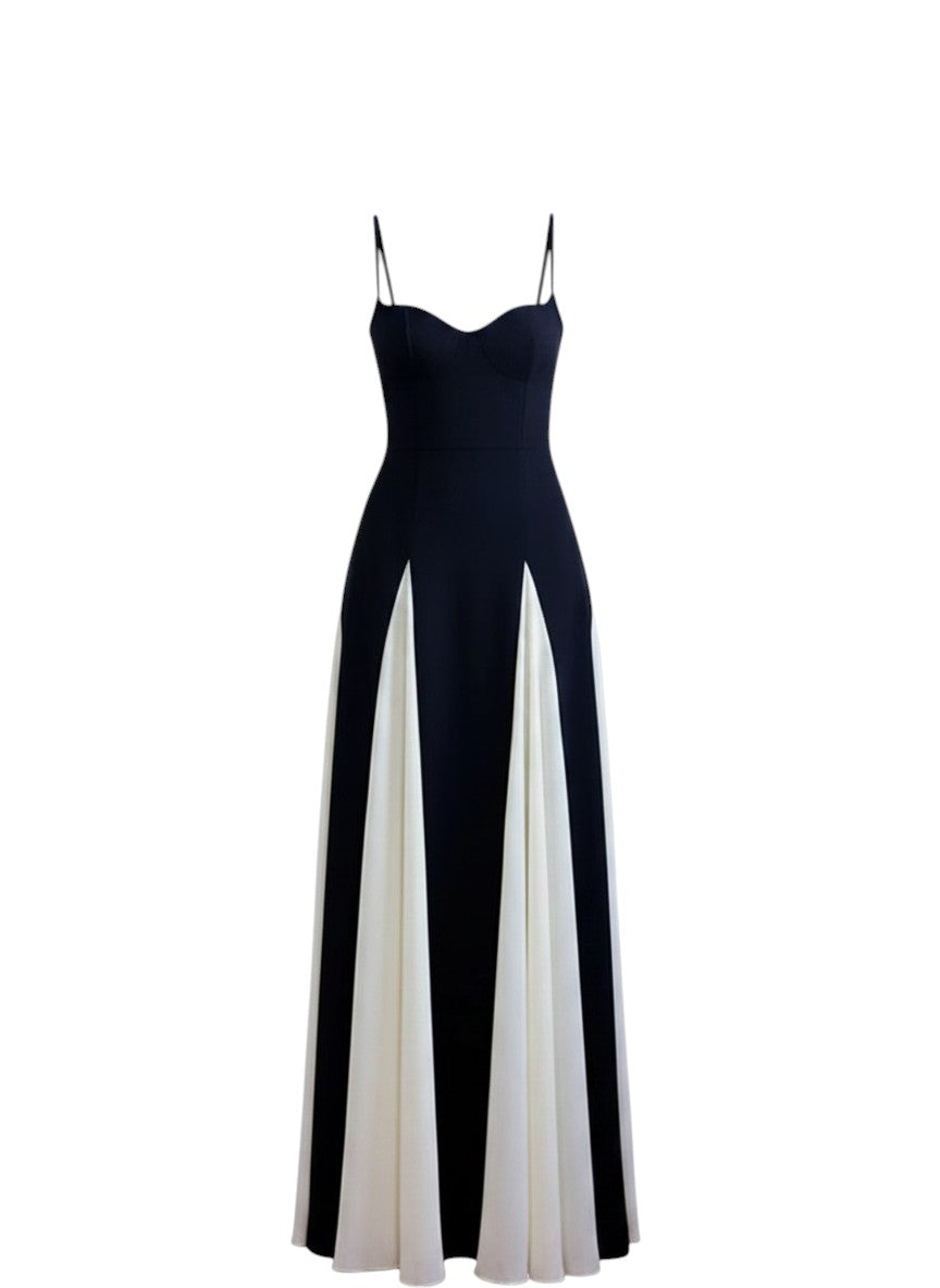 COMFORTH black and ivory evening gown with sweetheart neckline and flowing paneled skirt. Spaghetti straps.