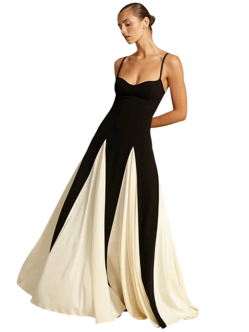 COMFORTH black and ivory evening gown with sweetheart neckline, spaghetti straps, and flowing paneled skirt.