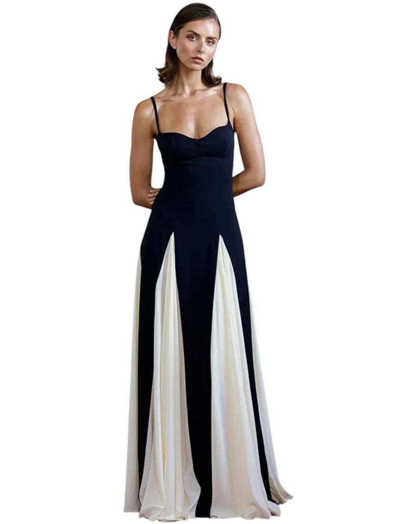 COMFORTElegant black and ivory evening gown with sweetheart neckline, spaghetti straps, and flowing paneled skirt.