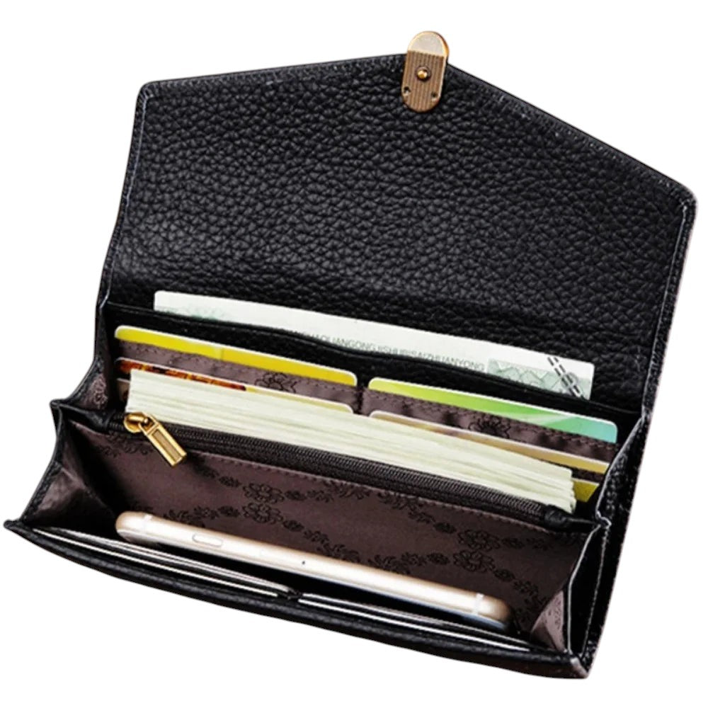COMFORTH black textured leather envelope wallet with gold clasp, card slots, zippered pocket, and phone compartment.