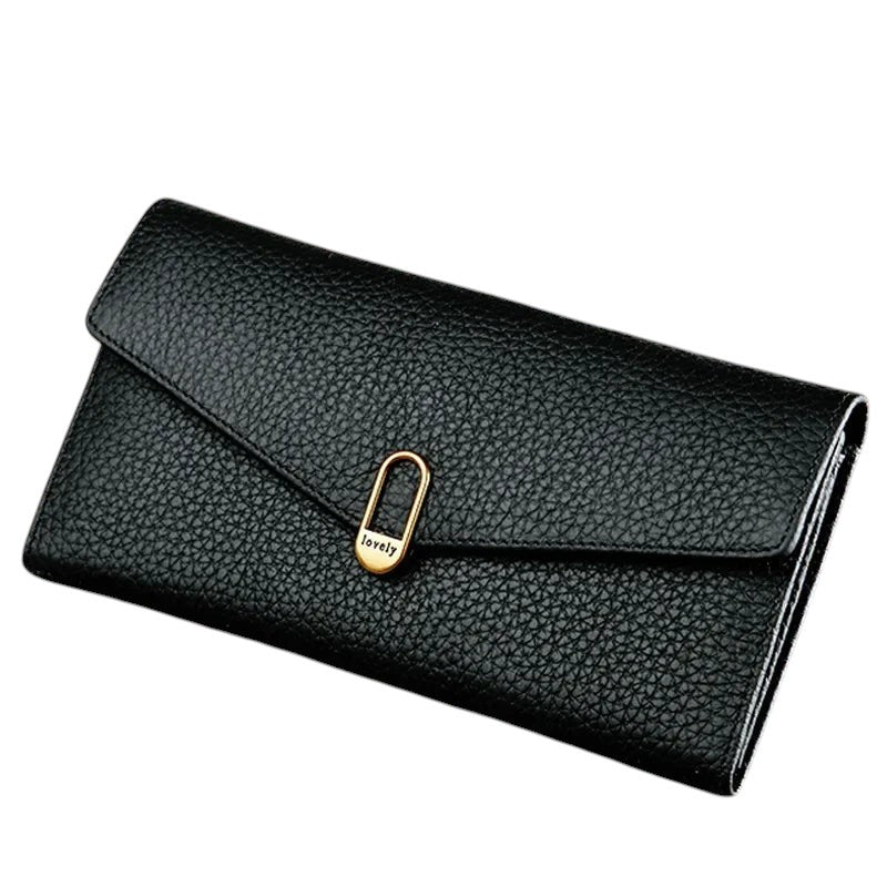 COMFORTH black textured leather envelope wallet with gold clasp and "lovely" detail.