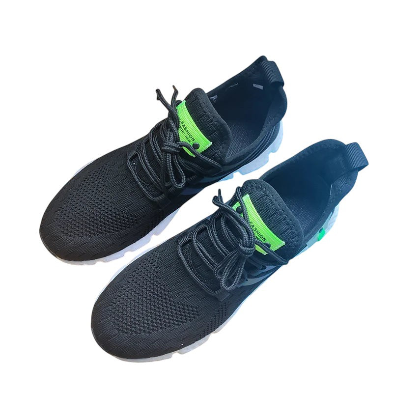 COMFORTH black mesh running sneakers with green accents and cushioned soles.
