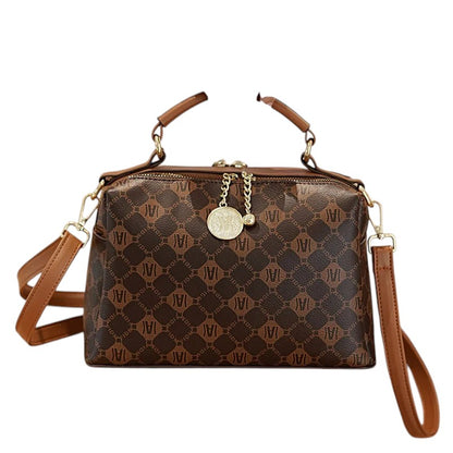 COMFORTH brown faux leather monogram satchel handbag with gold-tone charm and scarf accent on top handles.