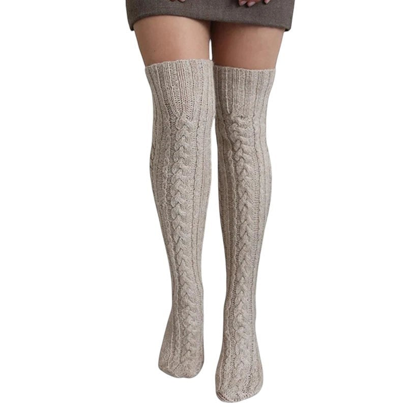 COMFORTH cable knit thigh high socks in creamy beige. Soft, breathable blend with classic cable pattern for warmth and style.