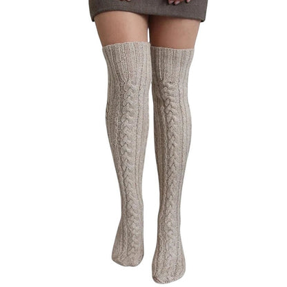COMFORTH cable knit thigh high socks in creamy beige. Soft, breathable blend with classic cable pattern for warmth and style.