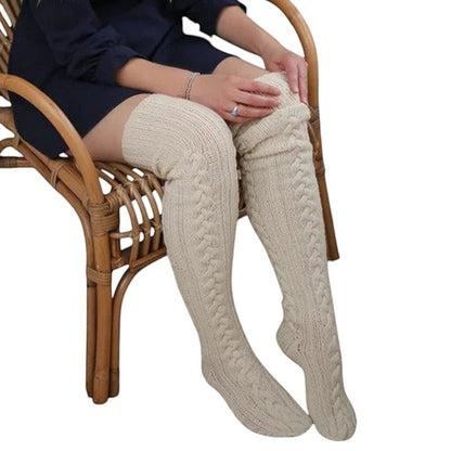 COMFORTH cream cable knit thigh high socks for women. Soft, warm, and cozy, perfect for winter.