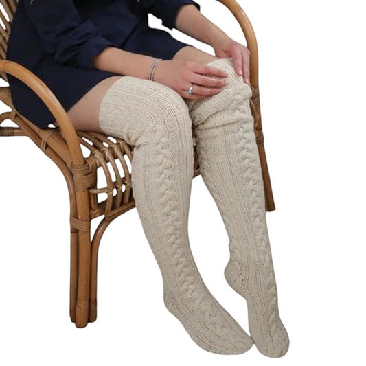 COMFORTH cream cable knit thigh high socks for women. Soft, warm, and cozy, perfect for winter.