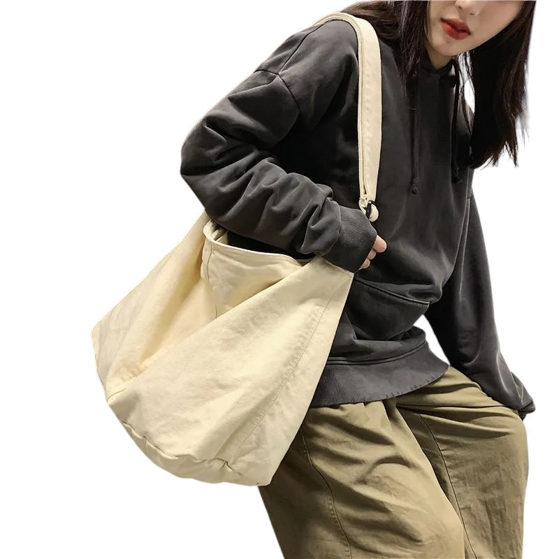 COMFORT cream canvas shoulder tote bag with a relaxed silhouette and comfortable strap, perfect for everyday use.