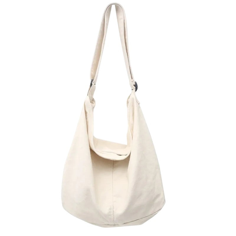 COMFORT cream canvas shoulder tote bag with a relaxed silhouette and comfortable strap, perfect for everyday use.