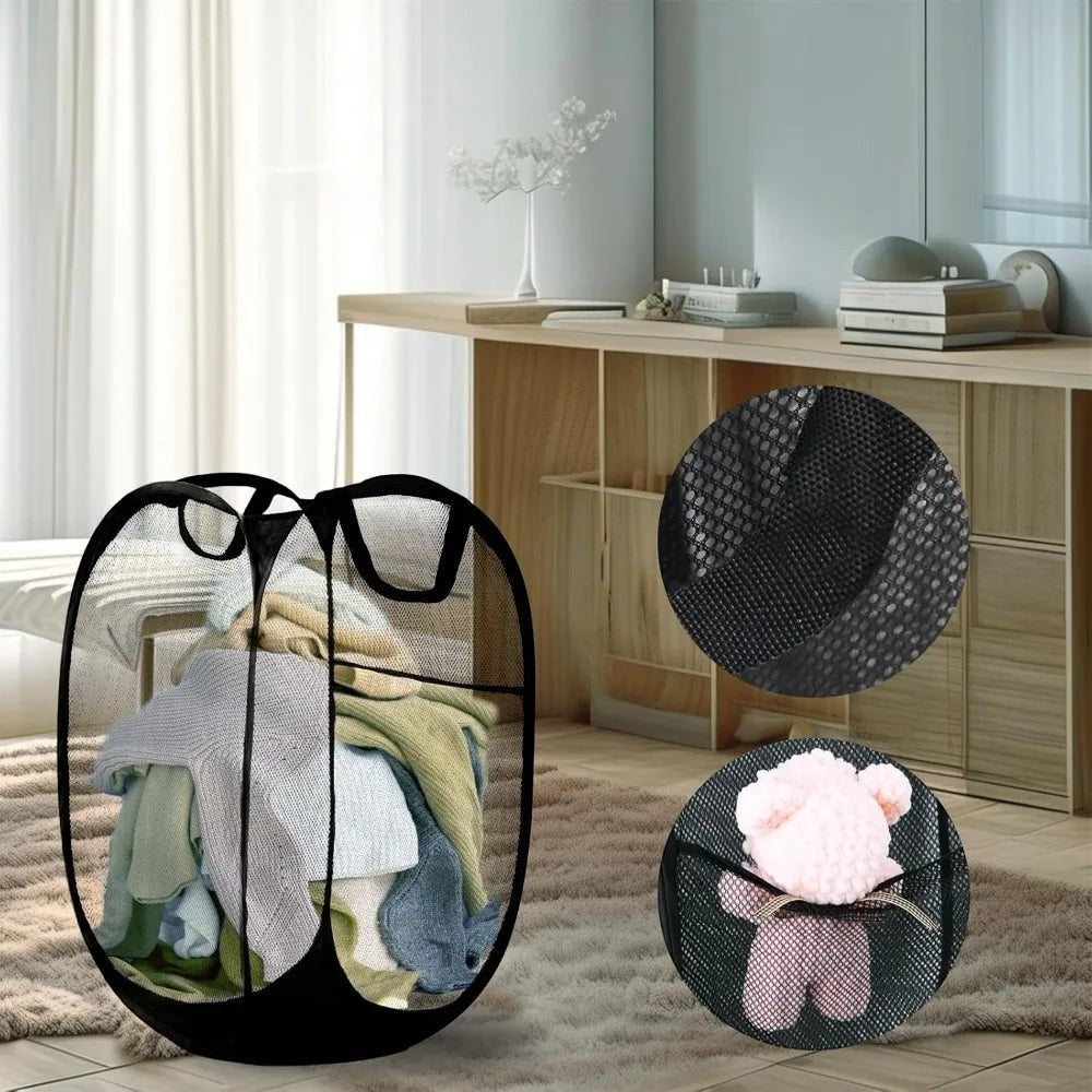 COMFORTH black collapsible mesh laundry hamper with handles, filled with clothes and a small teddy bear. Breathable mesh design.