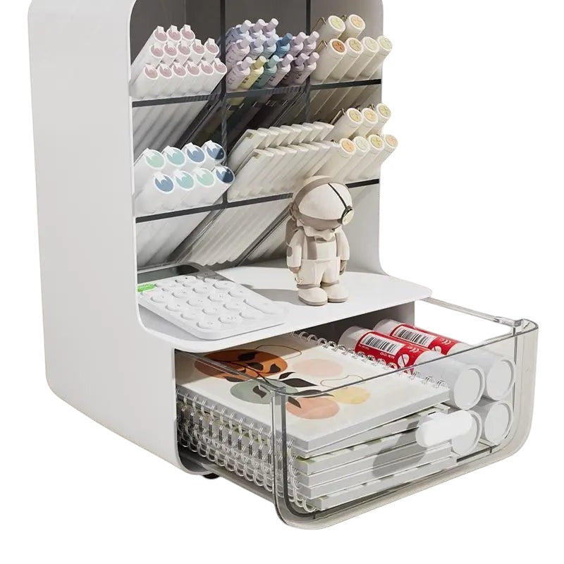 COMFORTH white multi-compartment desk organizer with drawers, holding pens, markers, calculator, notebooks, and glue sticks.