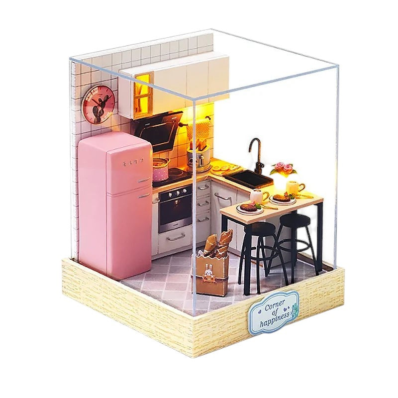 COMFORTH miniature dollhouse kitchen building kit with pink refrigerator, oven, sink, and dining bar.