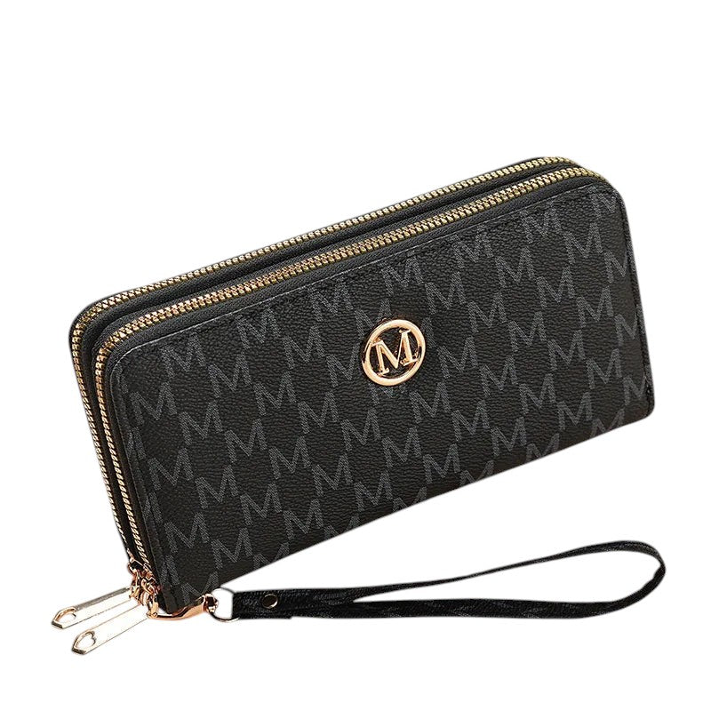 COMFORTH Double Zip Wristlet Wallet in black faux leather with all-over monogram and gold emblem. Features multiple card slots and detachable strap.
