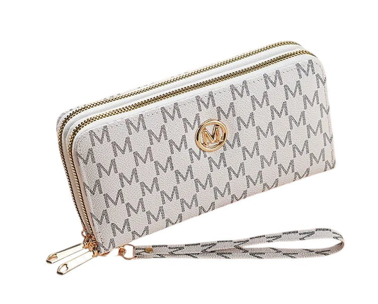 COMFORTH white faux leather wristlet wallet with all-over "M" monogram pattern and gold-tone emblem. Features dual zip compartments and card slots.