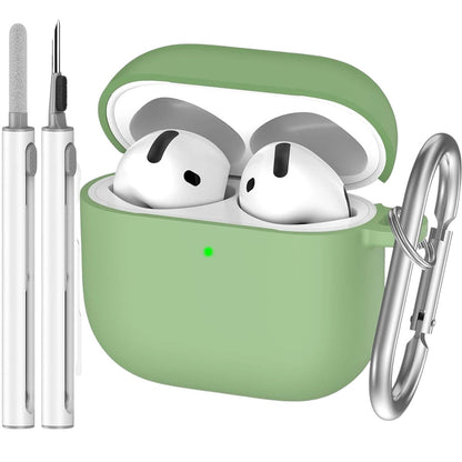 COMFORTH green silicone earbud charging case with keychain, includes cleaning pen. Holds white earbuds.