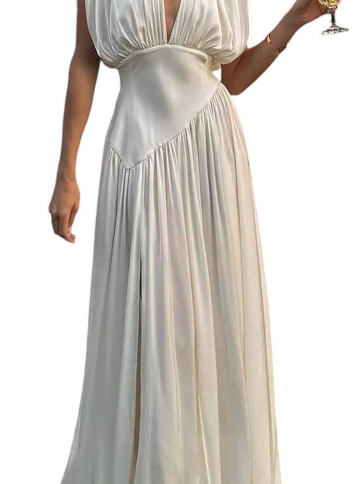 COMFORTH elegant ivory sleeveless deep V-neck maxi dress with flowing fabric and thigh-high slit.