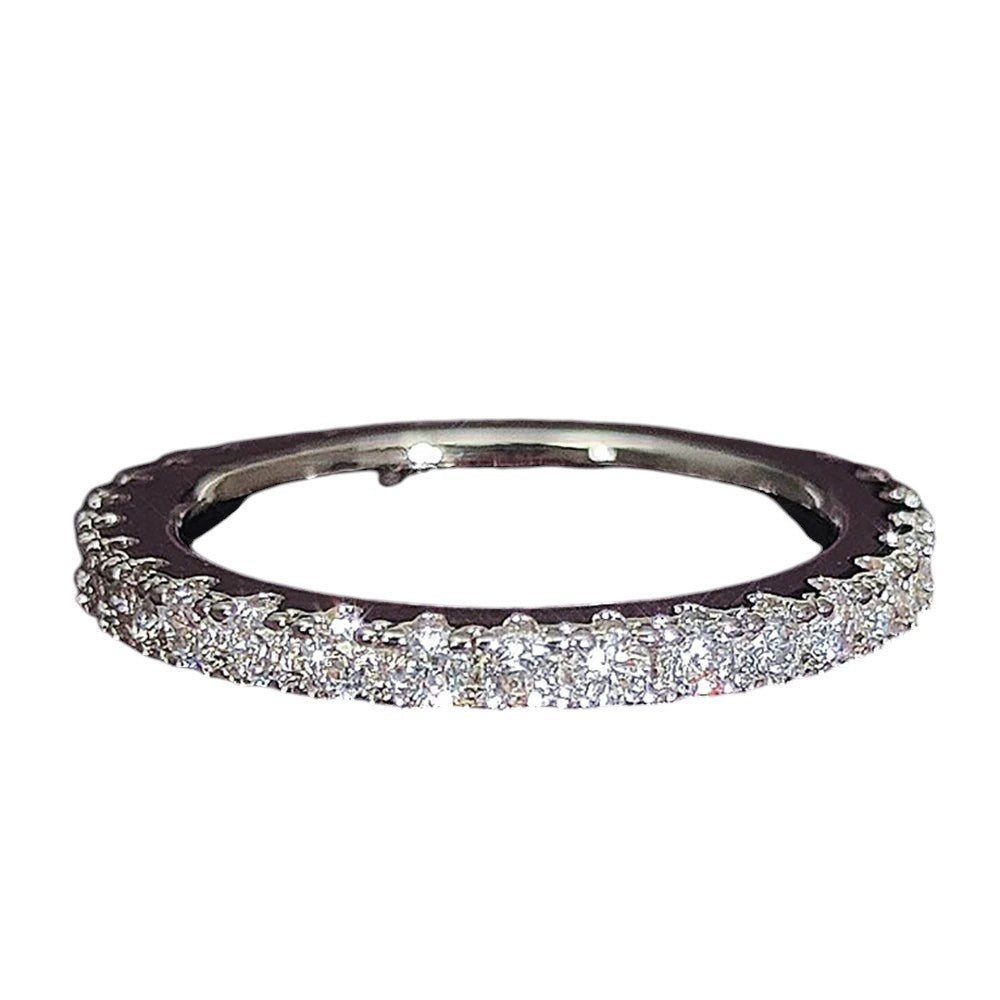 COMFORT sterling silver eternity band ring with cubic zirconia stones, perfect for stacking or as a statement piece.