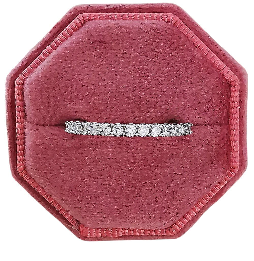 COMFORT sterling silver eternity band ring with cubic zirconia stones in a velvet ring box.