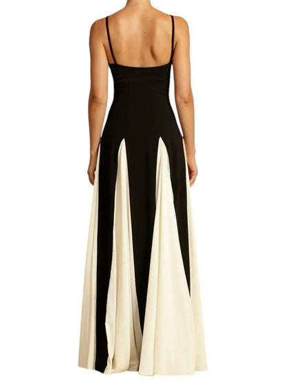 COMFORTEvening gown with black bodice and ivory flowing skirt, sweetheart neckline, spaghetti straps. Floor length.