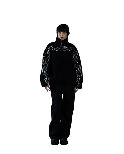 COMFORT black fleece jacket with abstract white flame graphic print, high collar, full zip, and relaxed fit.