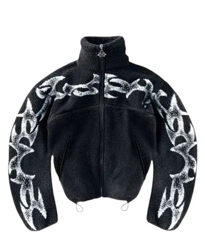 COMFORT black fleece jacket with white abstract flame graphic print, high collar, full zip, and drawstring hem.