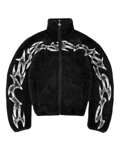 COMFORT black fleece jacket with white abstract flame graphic print, high collar, and full zip.