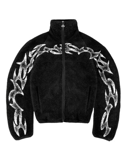 COMFORT black fleece jacket with white abstract flame graphic print, high collar, and full zip.
