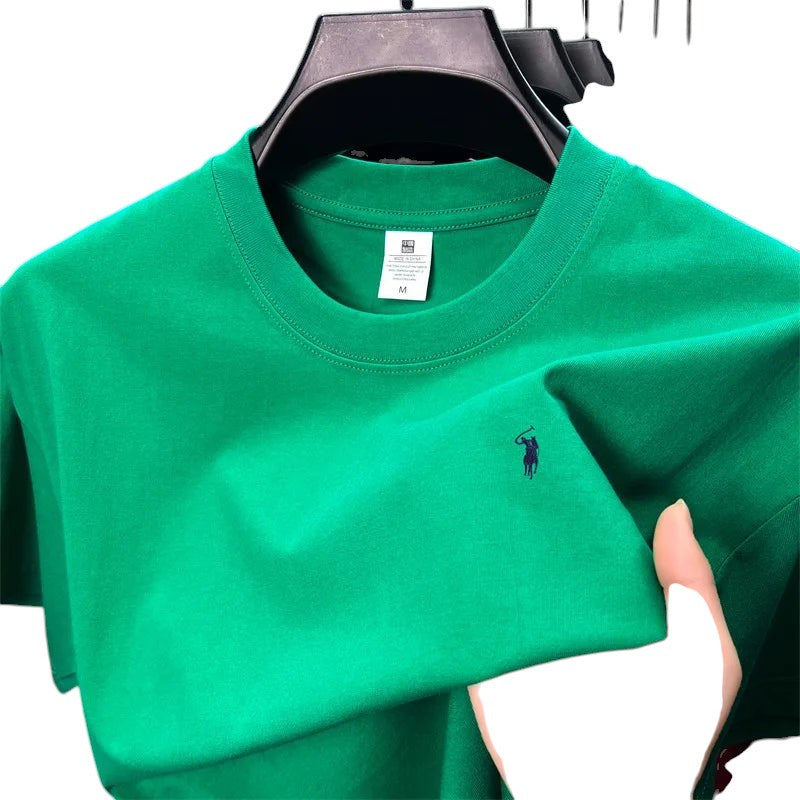 COMFORT green crew neck short sleeve t-shirt with embroidered logo on chest, made from cotton blend.